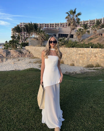 Abito lungo asimmetrico con scollatura senza spalline