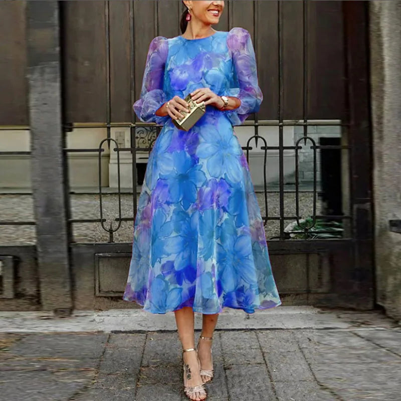 Abito formale da donna a maniche lunghe con delicata fantasia floreale per invitata a matrimonio 1