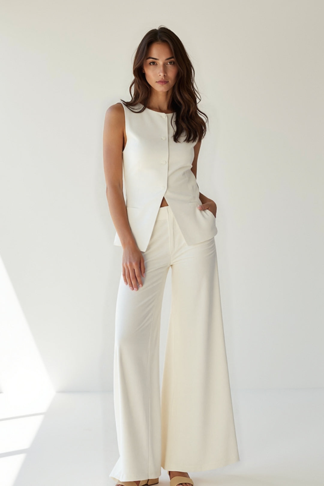 Completo elegante senza maniche con top e pantaloni a gamba larga | Bianco crema | Chic e raffinato 0