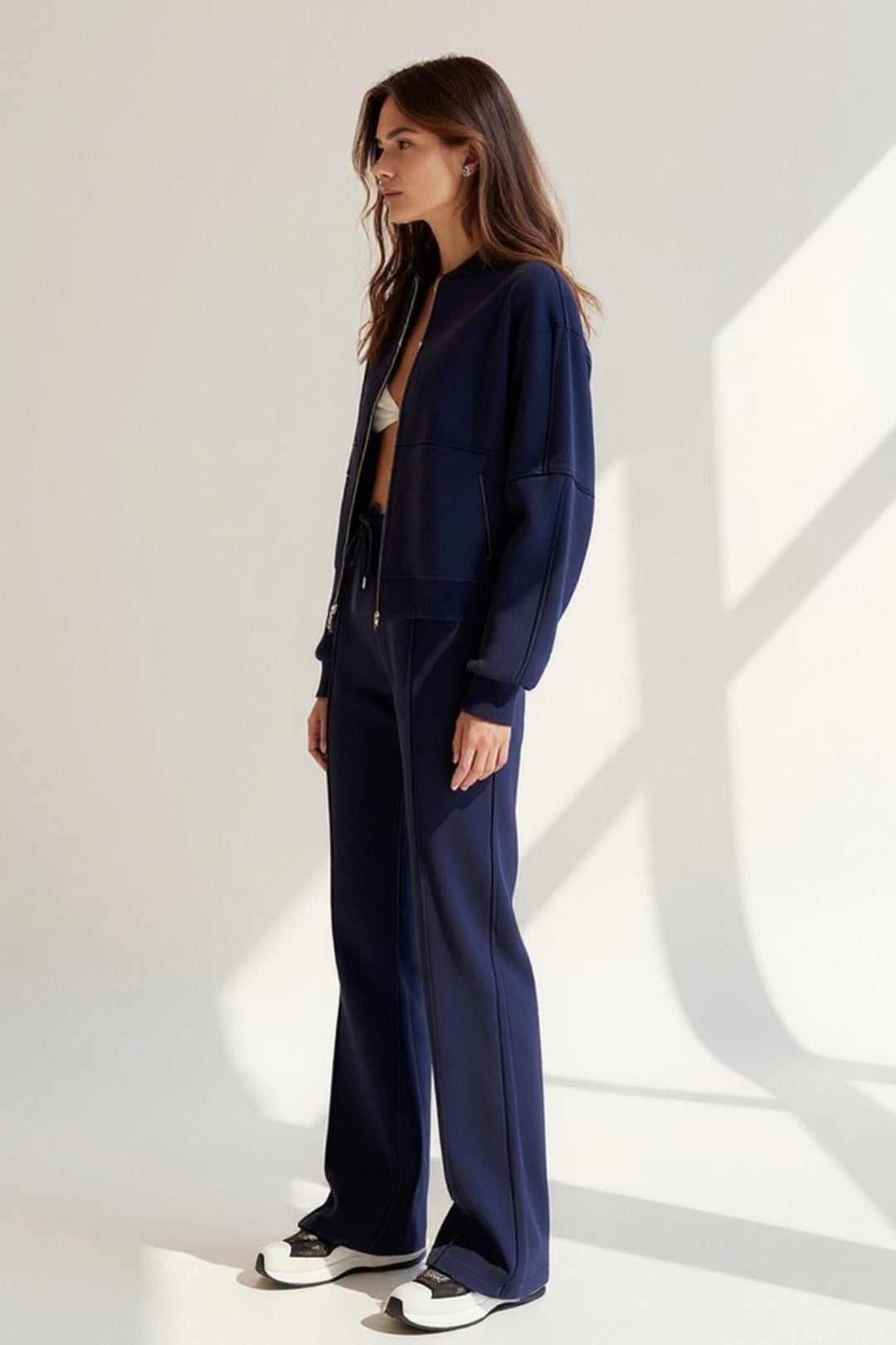 Set coordinato sportivo con giacca e pantaloni | Tessuto tecnico comodo 1